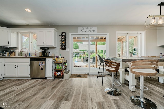 1616 Beech Cir, Plainfield, IN 46168 - kitchen featuring dishwasher, light wood-style flooring, white cabinetry, recessed lighting, and dark countertops