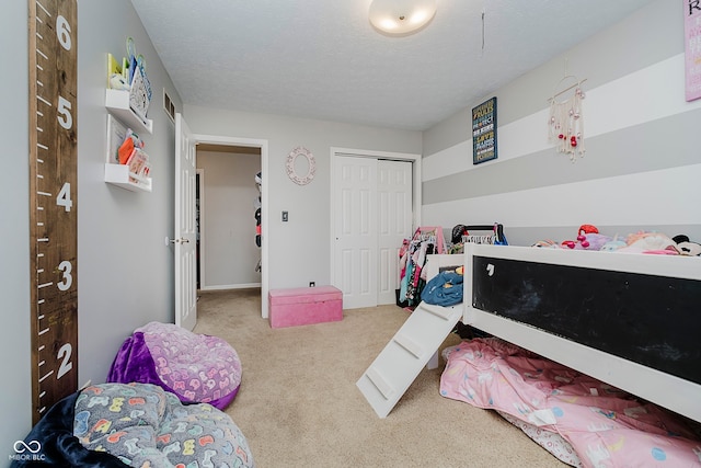 1616 Beech Cir, Plainfield, IN 46168 - bedroom featuring carpet, a closet, and a textured ceiling
