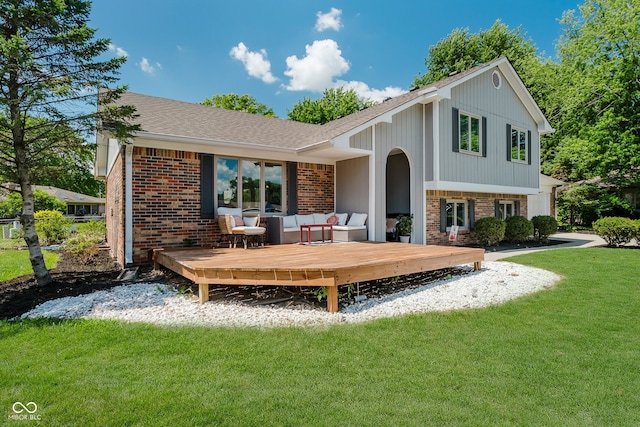 1616 Beech Cir, Plainfield, IN 46168 - rear view of house featuring brick siding, a wooden deck, a yard, and a shingled roof