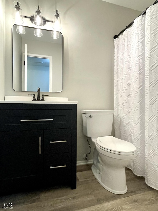4933 Oakwood Trl, Indianapolis, IN 46268 - bathroom featuring wood finished floors and vanity