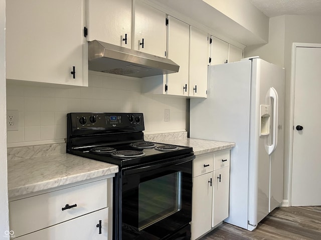 4933 Oakwood Trl, Indianapolis, IN 46268 - kitchen with black / electric stove, under cabinet range hood, white refrigerator with ice dispenser, dark wood finished floors, and tasteful backsplash