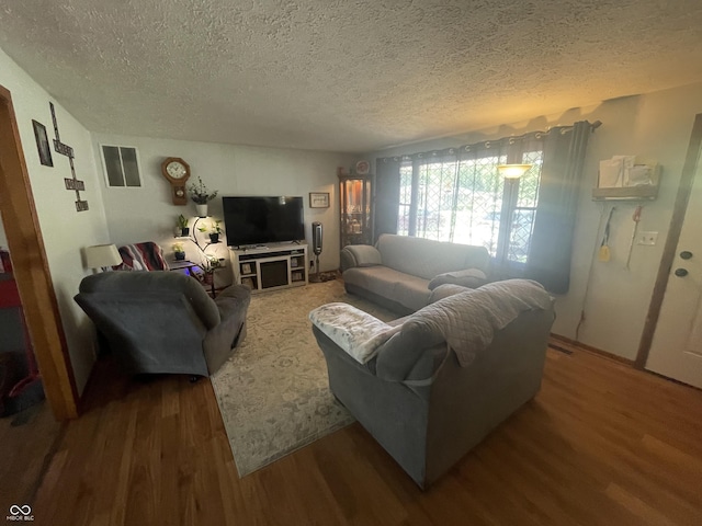 9783 Lee Ct, Columbus, IN 47203 - living room with wood finished floors and a textured ceiling