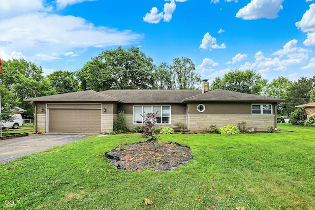 125 E Waterbury Rd, Indianapolis, IN 46227 - single story home with driveway, a garage, a chimney, a front yard, and stone siding