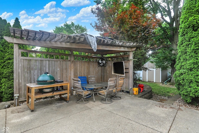 125 E Waterbury Rd, Indianapolis, IN 46227 - view of patio featuring a storage shed and outdoor dining area