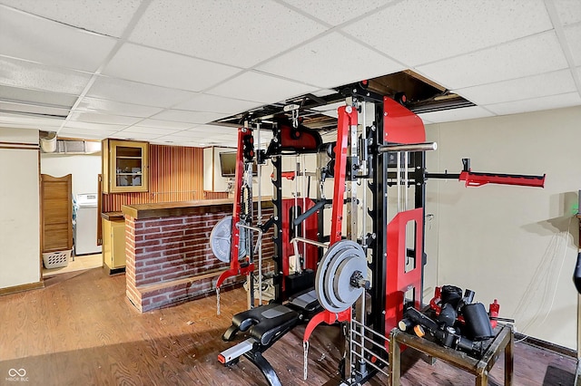 125 E Waterbury Rd, Indianapolis, IN 46227 - exercise room with a paneled ceiling, wood finished floors, and a dry bar