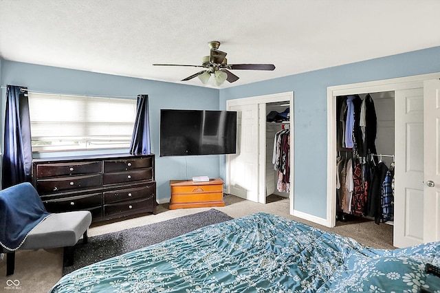 125 E Waterbury Rd, Indianapolis, IN 46227 - carpeted bedroom featuring two closets and ceiling fan