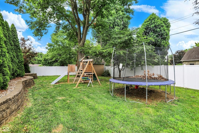 125 E Waterbury Rd, Indianapolis, IN 46227 - fenced backyard featuring a trampoline and a playground