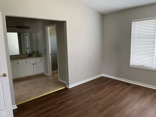 11332 Fonthill Dr, Indianapolis, IN 46236 - unfurnished room featuring dark wood-type flooring and baseboards