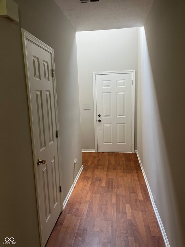 11332 Fonthill Dr, Indianapolis, IN 46236 - hallway with wood finished floors and baseboards