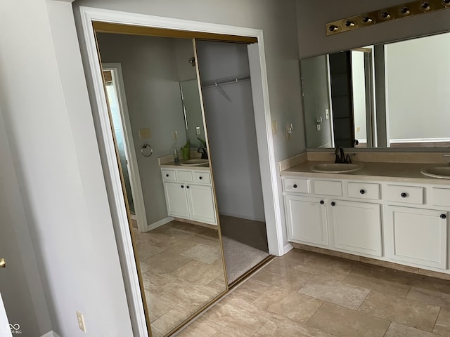 11332 Fonthill Dr, Indianapolis, IN 46236 - bathroom with double vanity and stone finish flooring