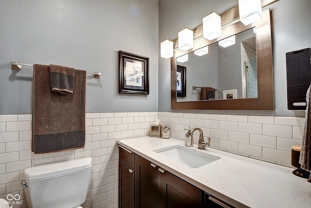1551 N Park Ave, Indianapolis, IN 46202 - bathroom with vanity, tile walls, and wainscoting