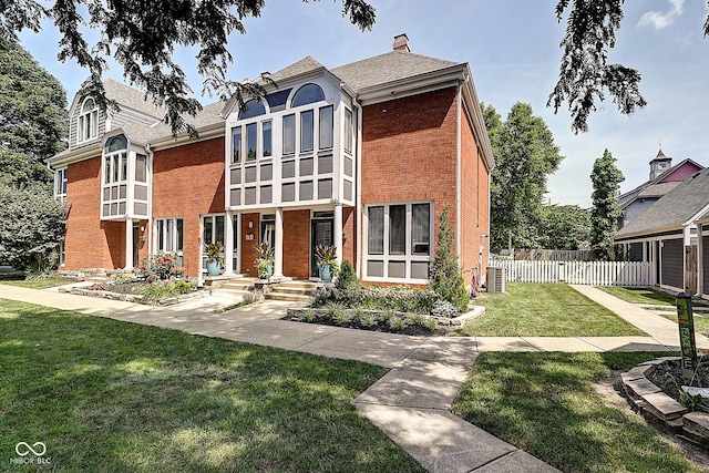 1551 N Park Ave, Indianapolis, IN 46202 - tudor home with brick siding and a chimney