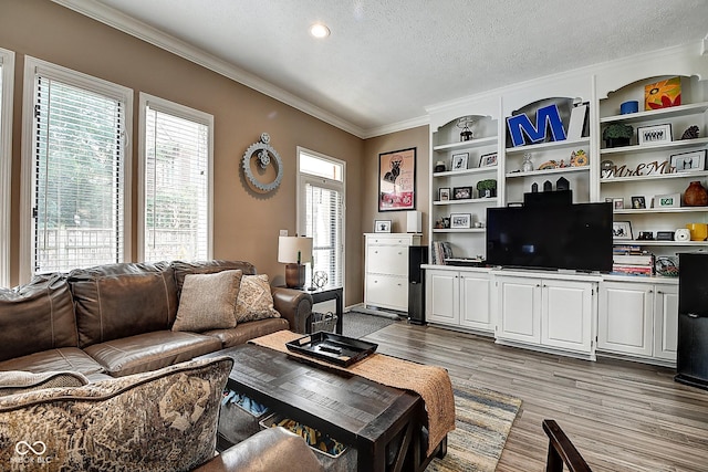 1551 N Park Ave, Indianapolis, IN 46202 - living room featuring crown molding, light wood-style flooring, a textured ceiling, recessed lighting, and built in features