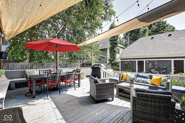 1551 N Park Ave, Indianapolis, IN 46202 - wooden deck featuring an outdoor living space, a fenced backyard, and outdoor dining space