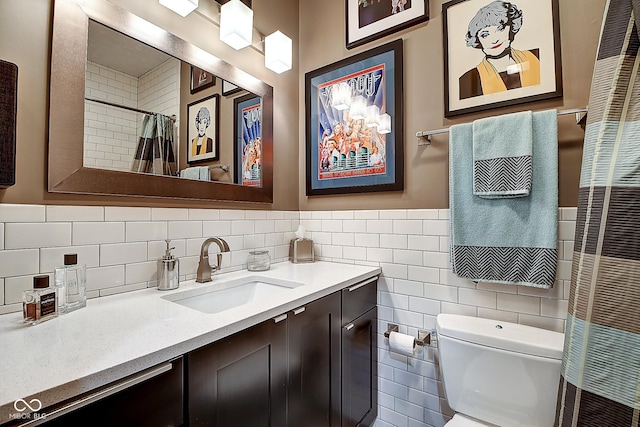 1551 N Park Ave, Indianapolis, IN 46202 - full bathroom featuring vanity, tile walls, a shower with curtain, a wainscoted wall, and a heating unit