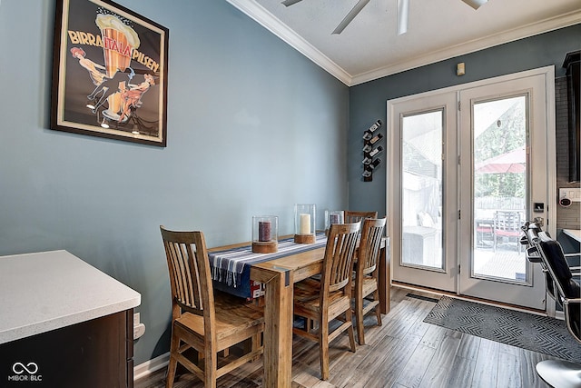 1551 N Park Ave, Indianapolis, IN 46202 - dining room with ornamental molding, wood finished floors, and ceiling fan