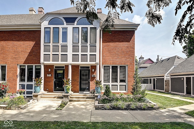 1551 N Park Ave, Indianapolis, IN 46202 - view of front of home with brick siding and a chimney