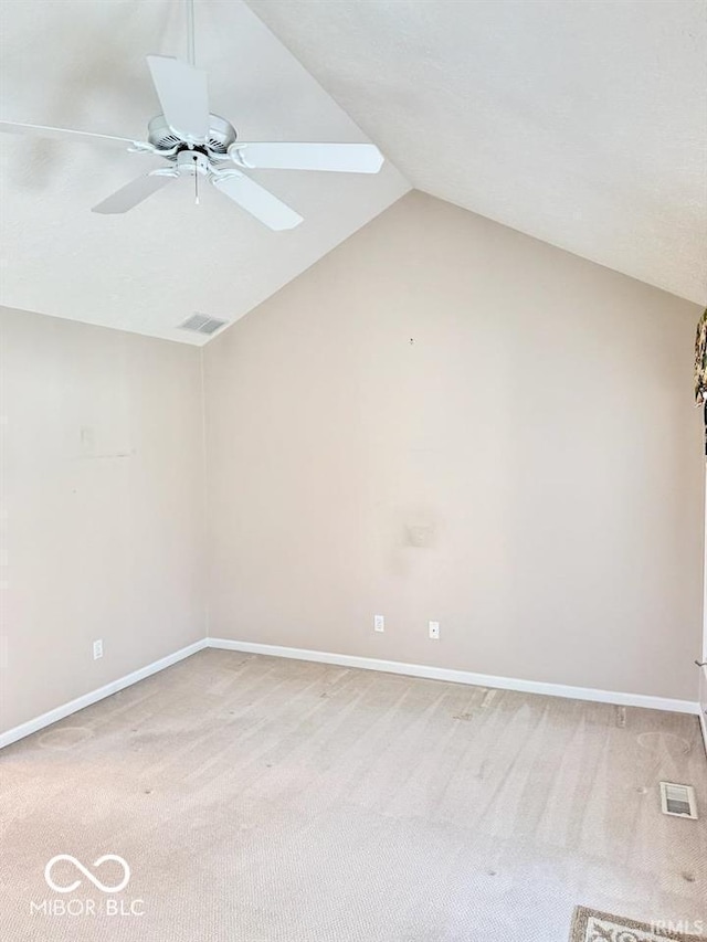 3400 W Riggin Rd, Muncie, IN 47304 - unfurnished room with light carpet, lofted ceiling, and ceiling fan