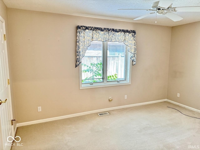 3400 W Riggin Rd, Muncie, IN 47304 - carpeted spare room with baseboards and ceiling fan