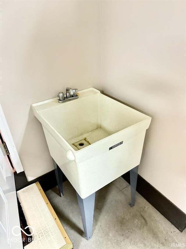 3400 W Riggin Rd, Muncie, IN 47304 - bathroom with concrete floors and a sink