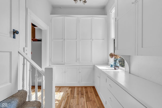 408 E Wabash Ave, Crawfordsville, IN 47933 - bar area featuring light wood-type flooring and stairs