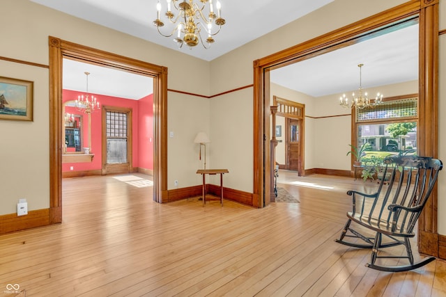 408 E Wabash Ave, Crawfordsville, IN 47933 - hallway with a chandelier and hardwood / wood-style flooring