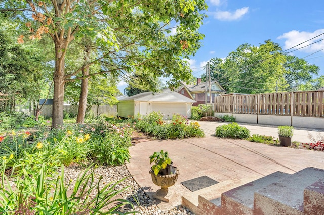 408 E Wabash Ave, Crawfordsville, IN 47933 - view of patio with an outdoor structure and a detached garage