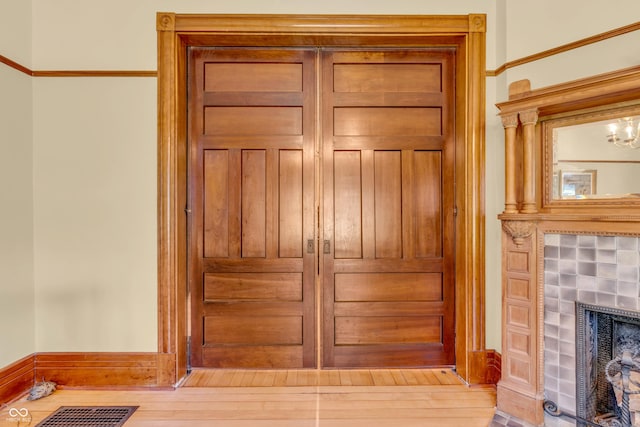 408 E Wabash Ave, Crawfordsville, IN 47933 - detailed view of a tile fireplace and wood finished floors