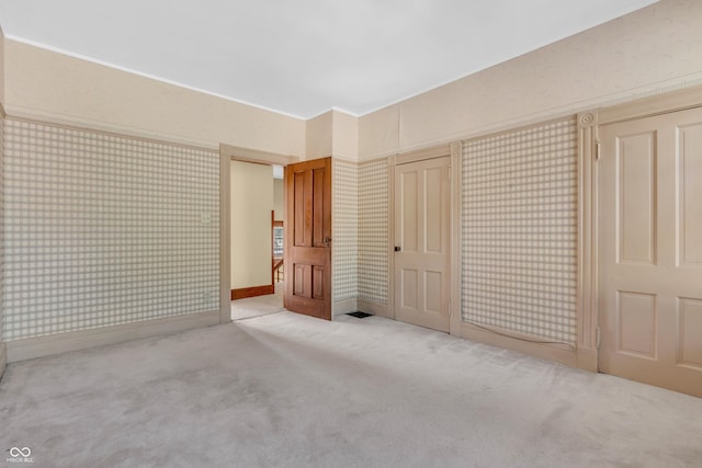 408 E Wabash Ave, Crawfordsville, IN 47933 - unfurnished bedroom featuring carpet flooring and baseboards