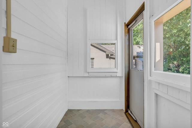 408 E Wabash Ave, Crawfordsville, IN 47933 - doorway featuring healthy amount of natural light and wooden walls