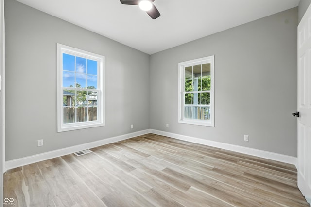 2012 N Dexter St, Indianapolis, IN 46202 - spare room with a ceiling fan and light wood finished floors