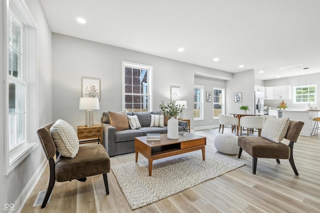 2012 N Dexter St, Indianapolis, IN 46202 - living room with light wood-style flooring and recessed lighting