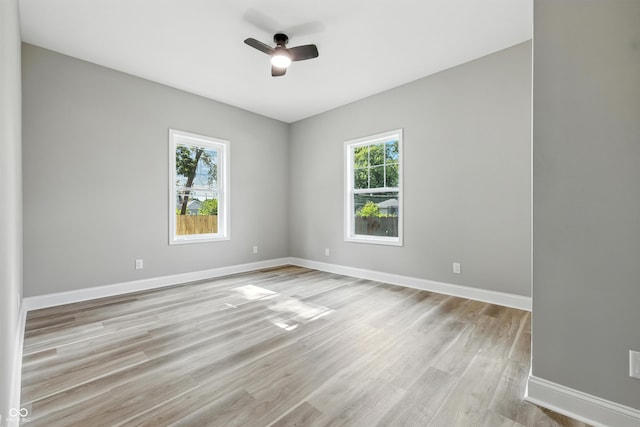 2012 N Dexter St, Indianapolis, IN 46202 - spare room featuring a ceiling fan and light wood-type flooring