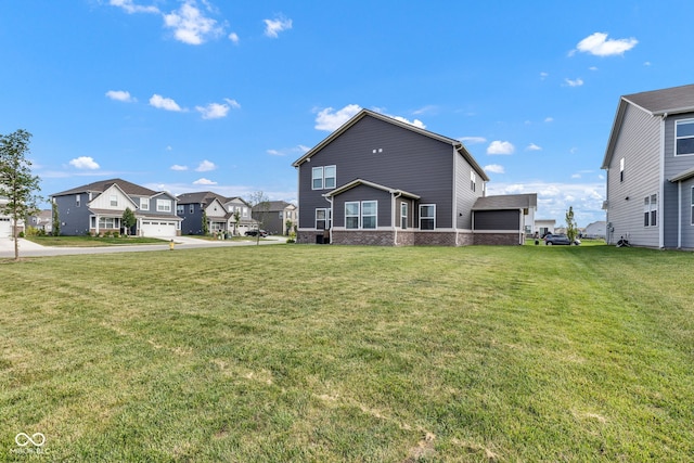11480 Plough St, Noblesville, IN 46060 - rear view of house featuring a residential view and a yard