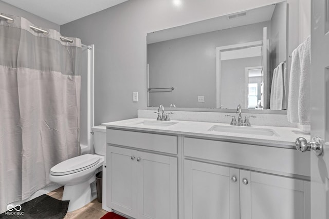 11480 Plough St, Noblesville, IN 46060 - full bath featuring double vanity, shower / bathtub combination with curtain, and wood finished floors