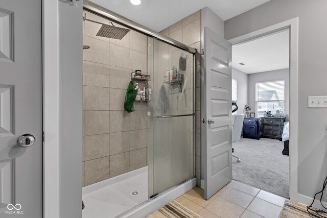 11480 Plough St, Noblesville, IN 46060 - ensuite bathroom with tile patterned floors, a shower stall, and recessed lighting