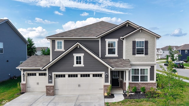 11480 Plough St, Noblesville, IN 46060 - view of front facade with brick siding, driveway, and a shingled roof