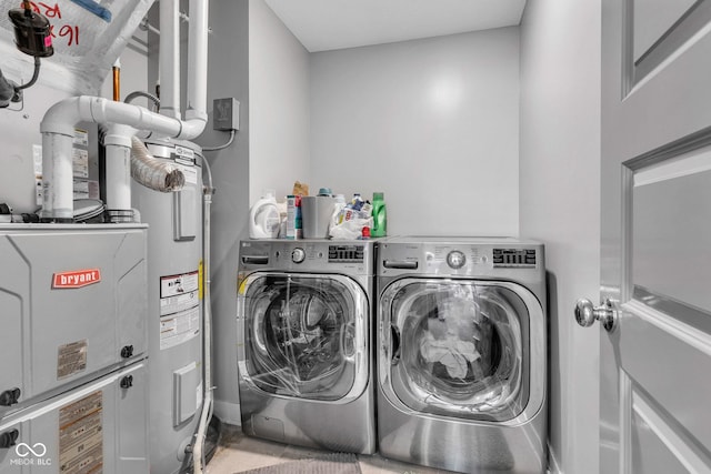 11480 Plough St, Noblesville, IN 46060 - washroom featuring washing machine and dryer and electric water heater