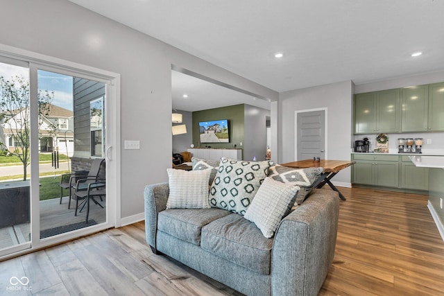 11480 Plough St, Noblesville, IN 46060 - living area featuring light wood finished floors and recessed lighting