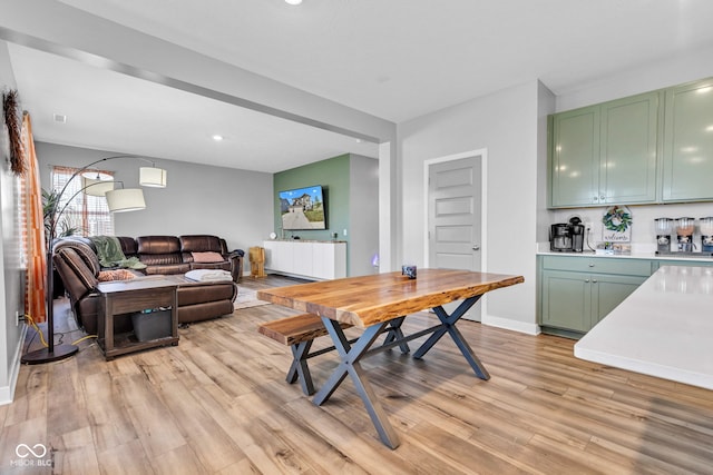 11480 Plough St, Noblesville, IN 46060 - dining space with light wood-style floors, recessed lighting, and bar area