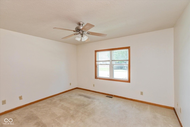 221 N Adams St, Brownsburg, IN 46112 - empty room with light carpet and a ceiling fan