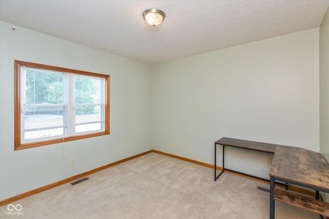 221 N Adams St, Brownsburg, IN 46112 - unfurnished room featuring light colored carpet and a textured ceiling