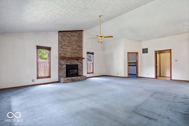 3628 Paddington Cir, Indianapolis, IN 46268 - unfurnished living room with carpet, a textured ceiling, a ceiling fan, high vaulted ceiling, and a brick fireplace