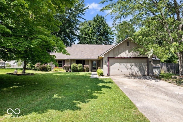 3628 Paddington Cir, Indianapolis, IN 46268 - view of front of house with an attached garage and concrete driveway