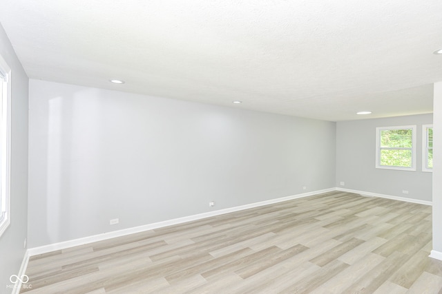 2521 Winfield Ave, Indianapolis, IN 46222 - unfurnished room featuring light wood-style flooring and recessed lighting