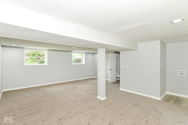 2521 Winfield Ave, Indianapolis, IN 46222 - basement with carpet flooring, a textured ceiling, and recessed lighting
