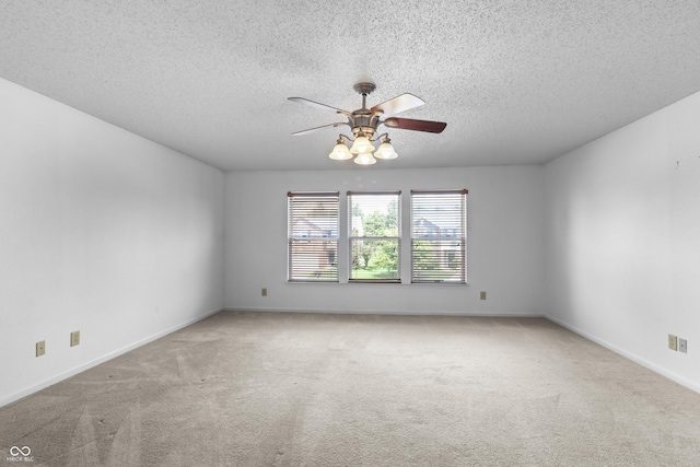 12443 Rose Haven Dr, Indianapolis, IN 46235 - carpeted spare room with a ceiling fan and a textured ceiling