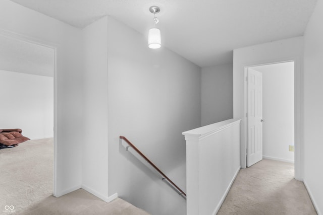 12443 Rose Haven Dr, Indianapolis, IN 46235 - hallway with an upstairs landing and carpet flooring