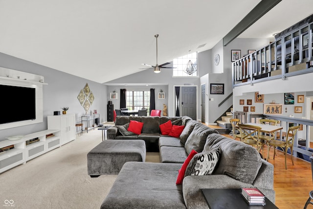 826 Royal Saint George Dr, Greenwood, IN 46143 - living room featuring stairway, high vaulted ceiling, and a ceiling fan