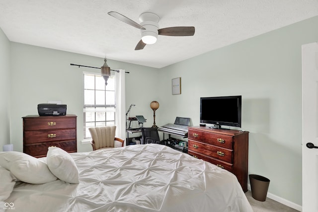 826 Royal Saint George Dr, Greenwood, IN 46143 - bedroom with carpet floors, ceiling fan, and a textured ceiling